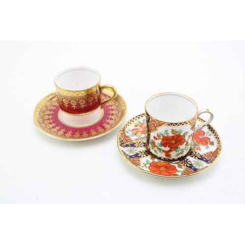 349 - An Aynsley coffee cup and saucer with Imari decoration together with another Aynsley cup and saucer ... 