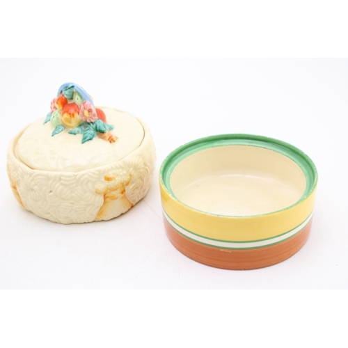 351 - Clarice Cliff to include a Celtic Harvest lidded jar, a Crocus base with a Wilkinson milk and sugar ... 