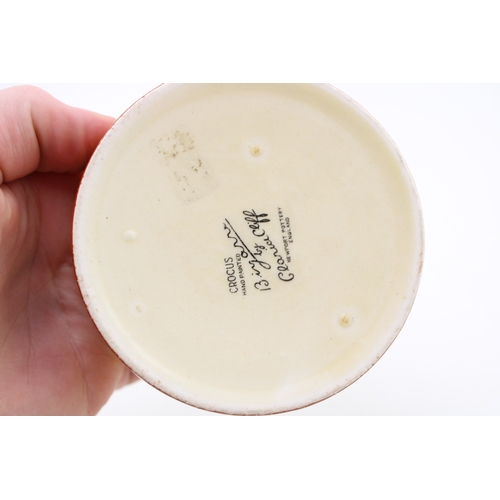 351 - Clarice Cliff to include a Celtic Harvest lidded jar, a Crocus base with a Wilkinson milk and sugar ... 