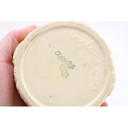 351 - Clarice Cliff to include a Celtic Harvest lidded jar, a Crocus base with a Wilkinson milk and sugar ... 