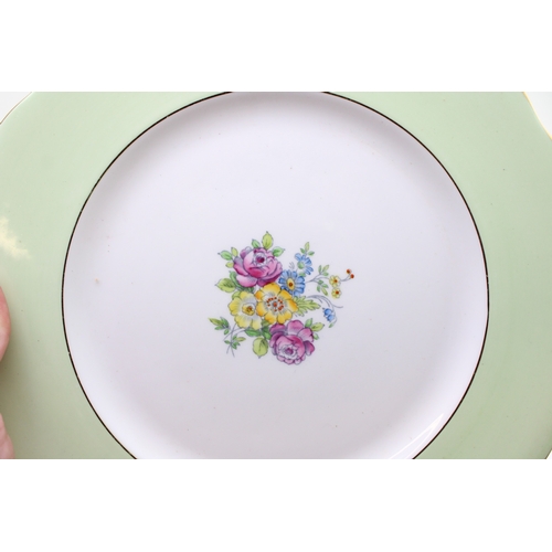 366 - A set of six Royal Albert cabinet plates with central floral sprays, light green background with gil... 