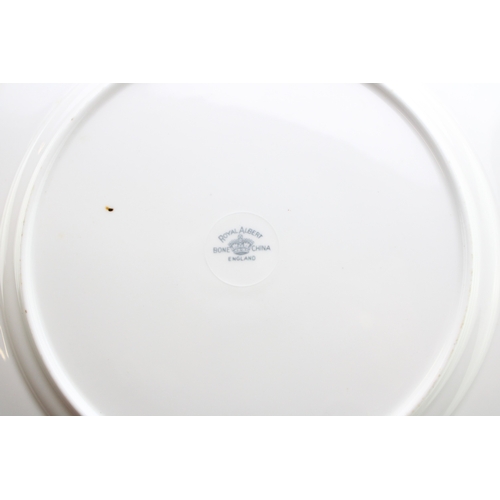 366 - A set of six Royal Albert cabinet plates with central floral sprays, light green background with gil... 