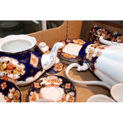 370 - Royal Albert 'Heirloom' pattern tea and coffee sets to include, teapot, six tea cup trios, milk jug ... 