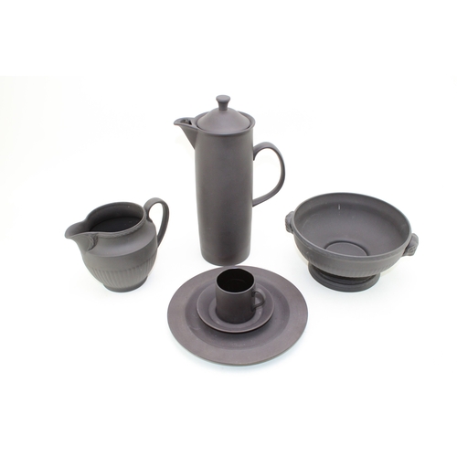 378 - Wedgwood Black Basalt porcelain to include a  Bowl with Ram terminals, Lidded Coffee Pot, Cup and Sa... 