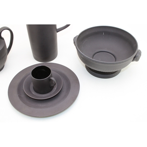 378 - Wedgwood Black Basalt porcelain to include a  Bowl with Ram terminals, Lidded Coffee Pot, Cup and Sa... 