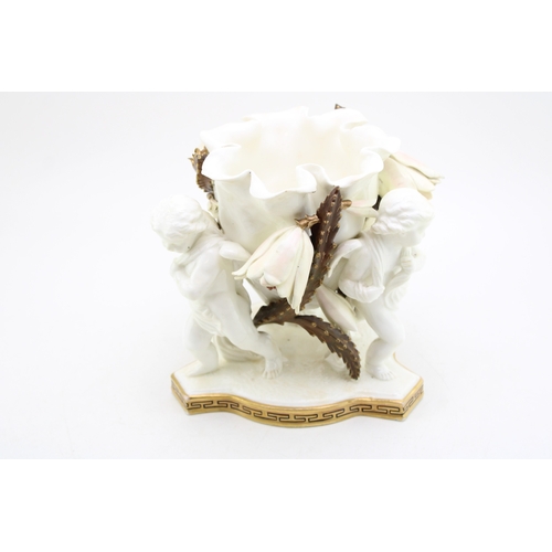 380 - Pre Minton Moore Pottery Table Centrepiece featuring The Putti with flowers