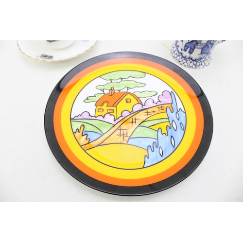 384 - Clarice Cliff by Wedgwood plate in the Orange Roof Cottage, a Doulton Burslem Diamond Jubilee 1897 c... 