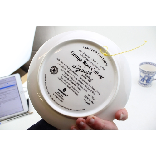 384 - Clarice Cliff by Wedgwood plate in the Orange Roof Cottage, a Doulton Burslem Diamond Jubilee 1897 c... 