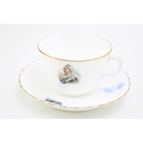 384 - Clarice Cliff by Wedgwood plate in the Orange Roof Cottage, a Doulton Burslem Diamond Jubilee 1897 c... 