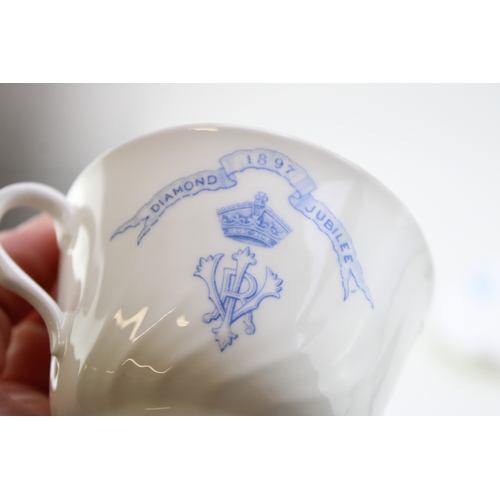 384 - Clarice Cliff by Wedgwood plate in the Orange Roof Cottage, a Doulton Burslem Diamond Jubilee 1897 c... 