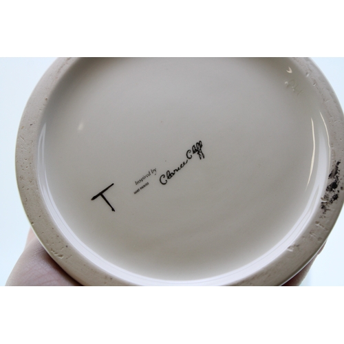 389 - Inspired by Clarice Cliff, probably Wedgwood, a trial vase in the May Avenue design in unusual green... 