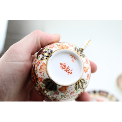 39 - Royal Crown Derby 'Old Imari' cup and saucer together with saucer and fluted vase / planters togethe... 
