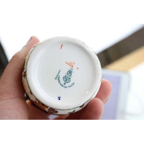 39 - Royal Crown Derby 'Old Imari' cup and saucer together with saucer and fluted vase / planters togethe... 