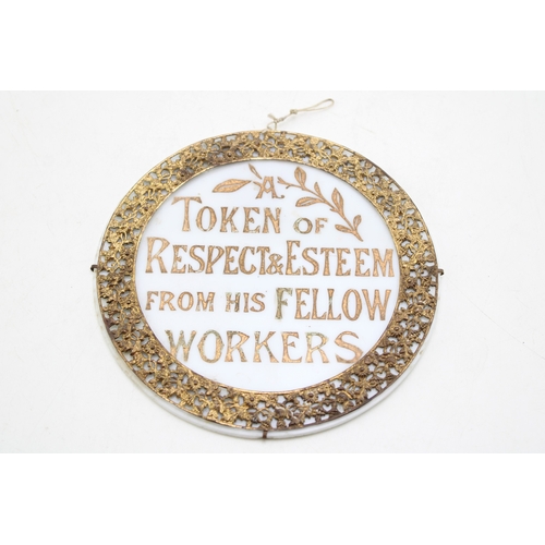 400 - An Edwardian glass roundel with gilt metal foliate decoration, 'A token of respect & esteem from his... 