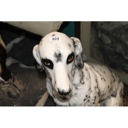 404 - A large lifesize pottery model of a dog, possibly a setter, 75cm tall, collection only.