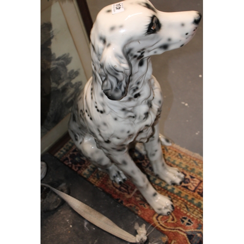404 - A large lifesize pottery model of a dog, possibly a setter, 75cm tall, collection only.