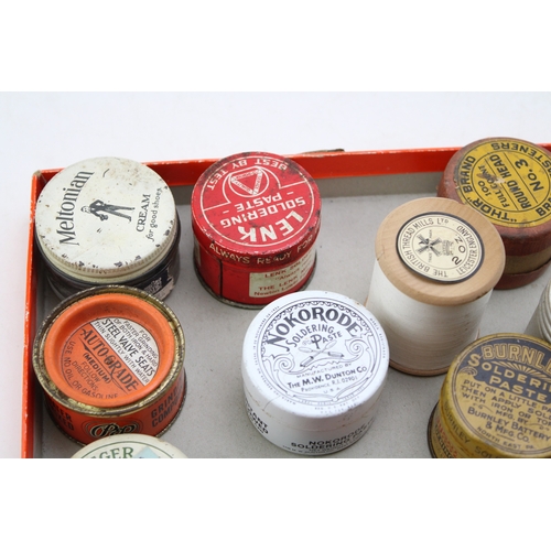 407 - A collection of early 20th century advertising tins and jars to include, Pflueger Hande-Par Fish Hoo... 