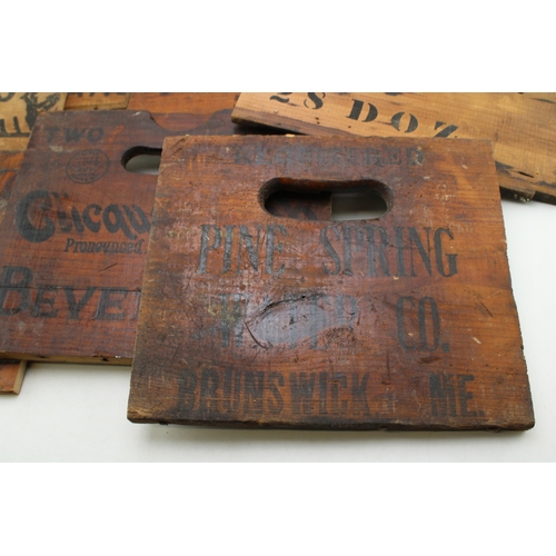 409 - A collection of advertising packing crate ends to include Pine Spring Water, Clicquot Club Beverages... 
