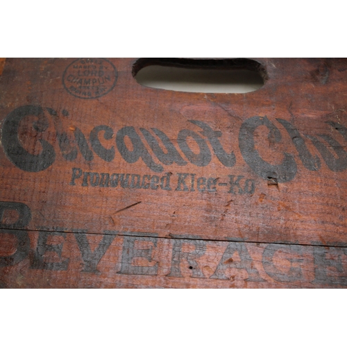 409 - A collection of advertising packing crate ends to include Pine Spring Water, Clicquot Club Beverages... 