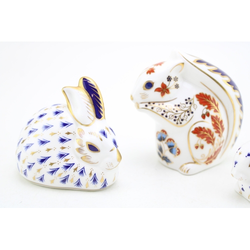 42 - A Royal Crown Derby paperweight, Squirrel, date mark for 1992 (LV), red Royal Crown Derby stamp on t... 