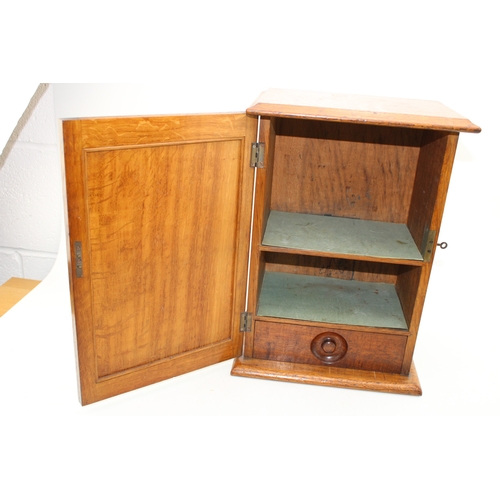 460 - Golden oak smokers cabinet with two internal shelves, and drawer, locking door with original key, 39... 