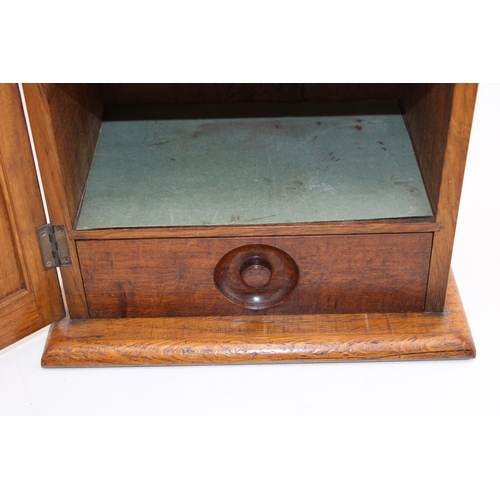 460 - Golden oak smokers cabinet with two internal shelves, and drawer, locking door with original key, 39... 