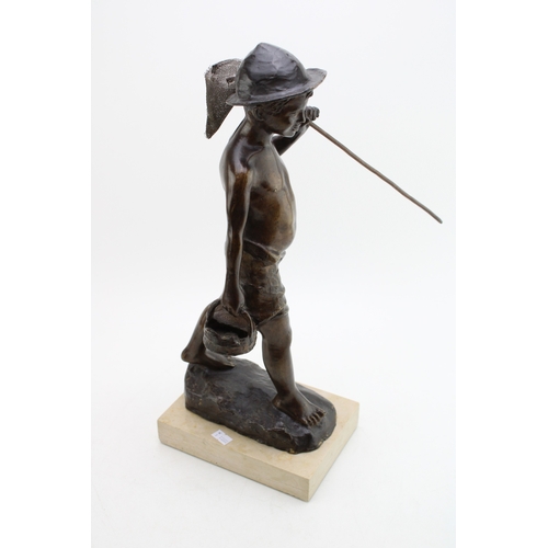 471 - A quality bronzed spelter stature of a fisherman, holding a net, mounted onto polished marble base, ... 
