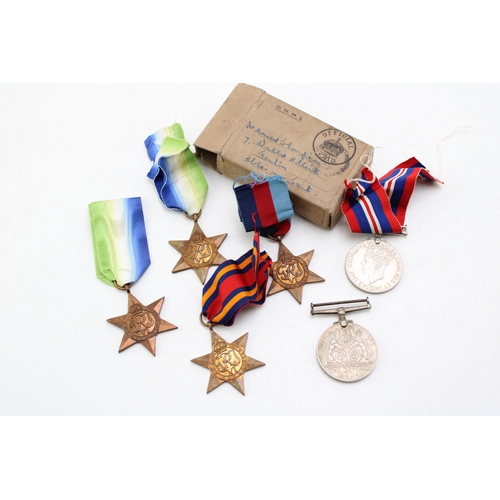 483 - A collection of World War Two medals to include two Atlantic Stars, The Burma Star, The 1939-45 Star... 