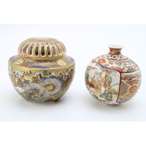 498 - Two Japanese Satsuma vases, one with lid and markings to base, 9cm tall.