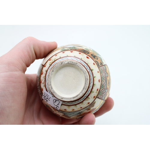 498 - Two Japanese Satsuma vases, one with lid and markings to base, 9cm tall.