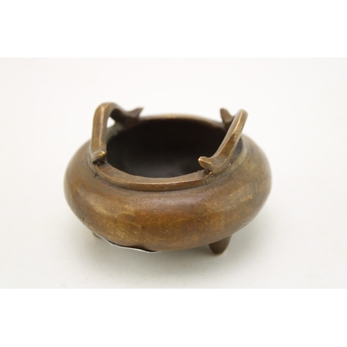 499 - Chinese bronze tripod censor, 5cm tall.
