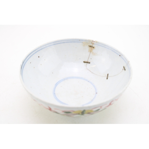508 - 19th century oriental bowl, enamelled decoration, with old stapled repairs, 15cm diameter.
