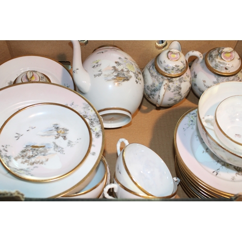 509 - An oriental export tea and coffee service to include teapots, cups, saucers and others (Qty).