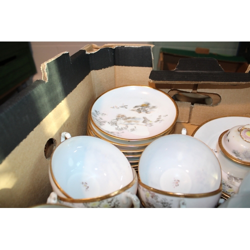 509 - An oriental export tea and coffee service to include teapots, cups, saucers and others (Qty).