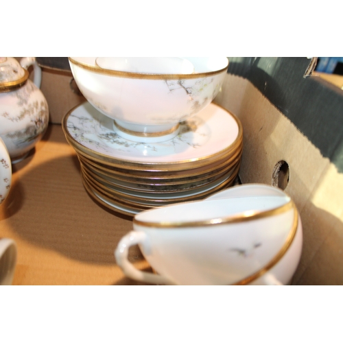 509 - An oriental export tea and coffee service to include teapots, cups, saucers and others (Qty).