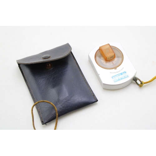 533 - Suunto Co. Finland sighting compass, KB-77/360RT bearing compass, in light alloy housing, in leather... 