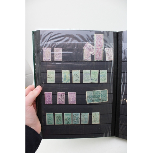 551 - A collection of UK stamps to include Queen Victoria Inland Revenue, Admiralty, George V and George V... 