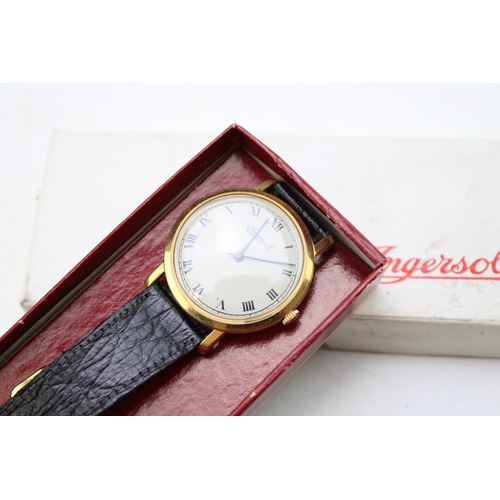 570 - Boxed Ingersoll gentleman's wristwatch, gold tone case, Roman numeral hour markers, black leather st... 