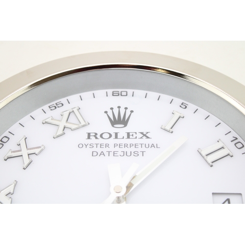 573 - A large dealership clock, in the style of an Oyster Perpetual Datejust, 34cm diameter.