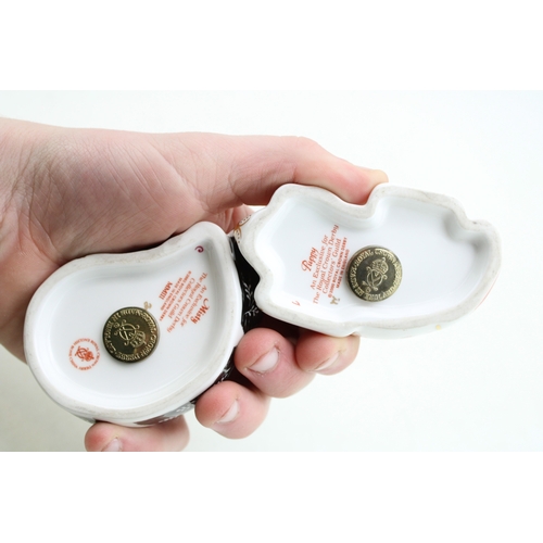 62 - Royal Crown Derby paperweights of a Puppy and Misty, first quality with gold stoppers (2).