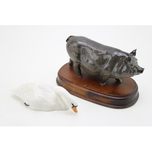 80 - Beswick Swan 1685 with a Vietnamese pot bellied pig (2).
