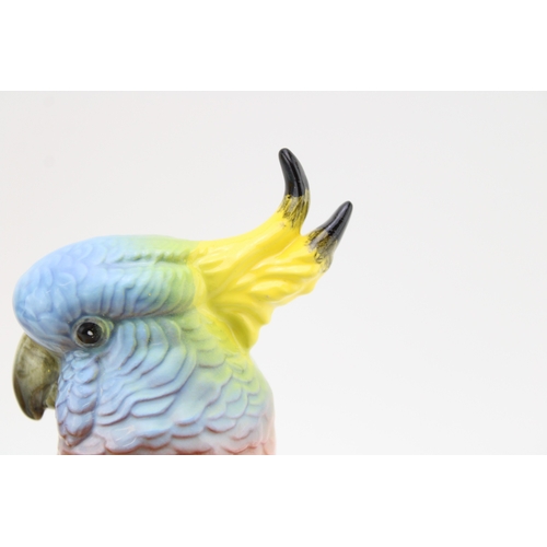 82 - Two Beswick cockatoo figures 1180 (both af).