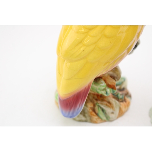 82 - Two Beswick cockatoo figures 1180 (both af).