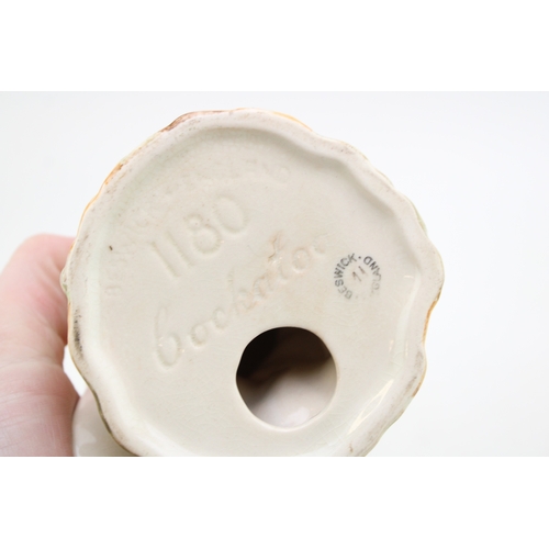 82 - Two Beswick cockatoo figures 1180 (both af).