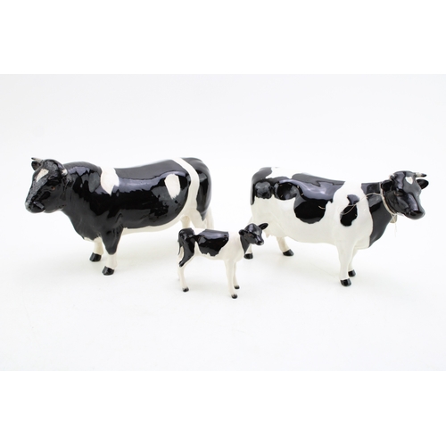 90 - Beswick Friesian cattle family to include the cow, the bull and the calf (3).