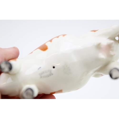 93 - A Beswick Ayreshire cow with an Ayrshire calf (2- calf's leg af).