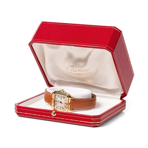 An 18ct gold cased Panthere de Cartier tank wristwatch, the signed dial having insignia pattern to the centre, minute track and Roman numerals at even points, with line of V of the seven marked with Cartier, blued hands, blue sapphire set crown, quartz movement, the named back plate marked 18K, with French hallmarks, and numbered 887971 over 000555, with original leather strap, with 18ct gold deployment clasp, complete with original Cartier fitted case, manual and certificate guarantee, dated 30th November 1996.
