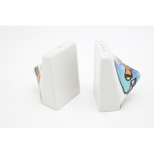 205 - A pair of Lorna Bailey cruets, abstract shape, probably in the Beeches design, 7.5cm tall (2).