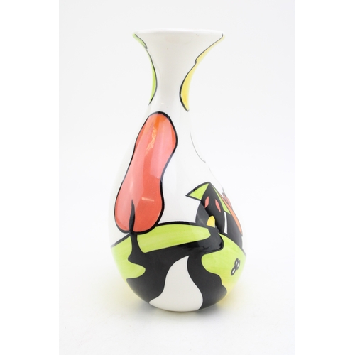 208 - Lorna Bailey vase in the Hillside Cottage pattern, 19cm tall.