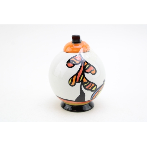209 - Lorna Bailey lidded jar with Art Deco inspired lid, in The Beeches pattern, 10cm tall.